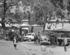 Front gate with local taxis. Aira Hospital, Ethiopia.  Photographer: James Li, M.D.